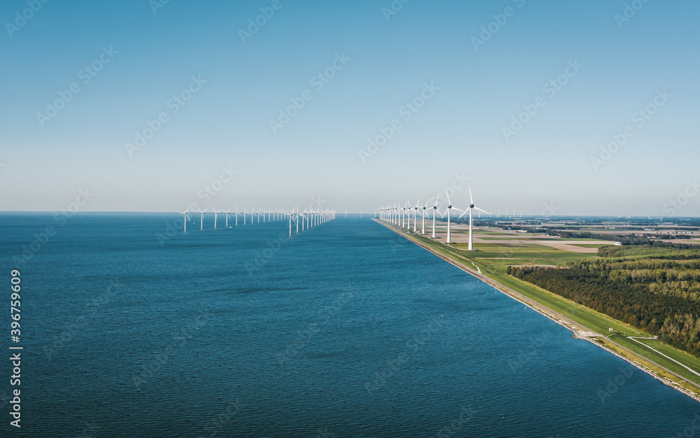 Offshore and near-shore wind farm Windpark Noordoostpolder near Urk, Flevoland, The Netherlands. Aerial view.  - obrazy, fototapety, plakaty 