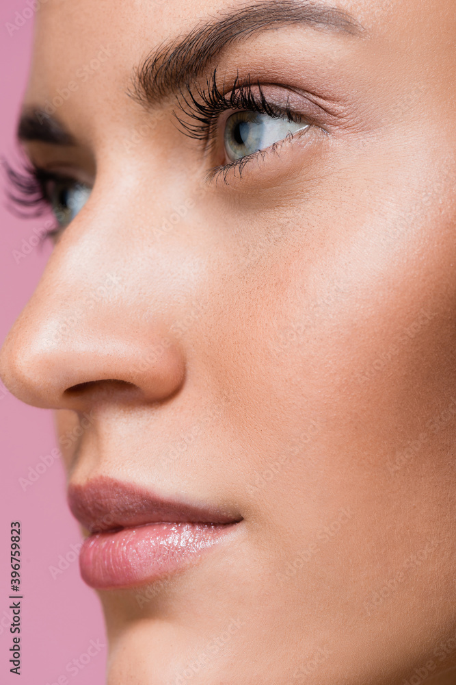 Naklejka premium closeup of beautiful woman with perfect skin isolated on pink