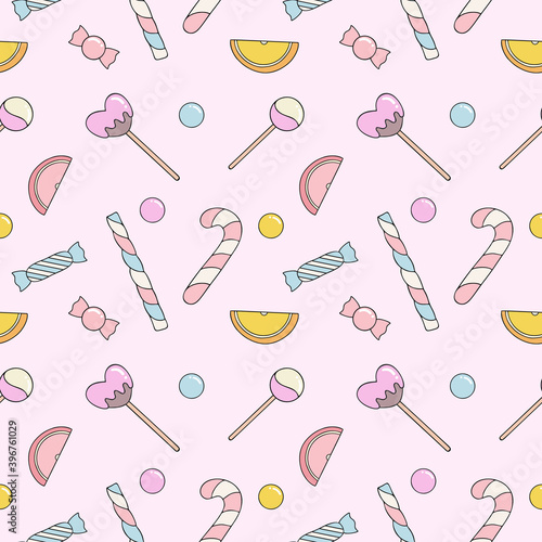 Pink pattern with sweet candies and lollipops. Seamless background for tailoring. Wallpaper for textiles, packaging paper.