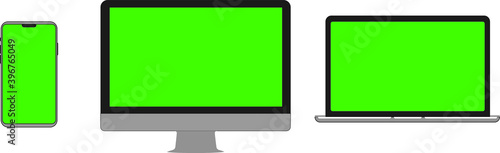 Three devices with green screen. Smartphone, computer and laptop with place for advertising. Modern gadgets with chromakey space on screen. Mobile phone, PC and notebook.