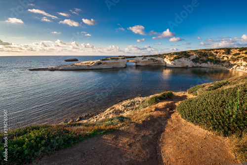 Limestone rock with arch, S'`Archittu di Santa Caterina in Oristano Province, Sardinia, Italy