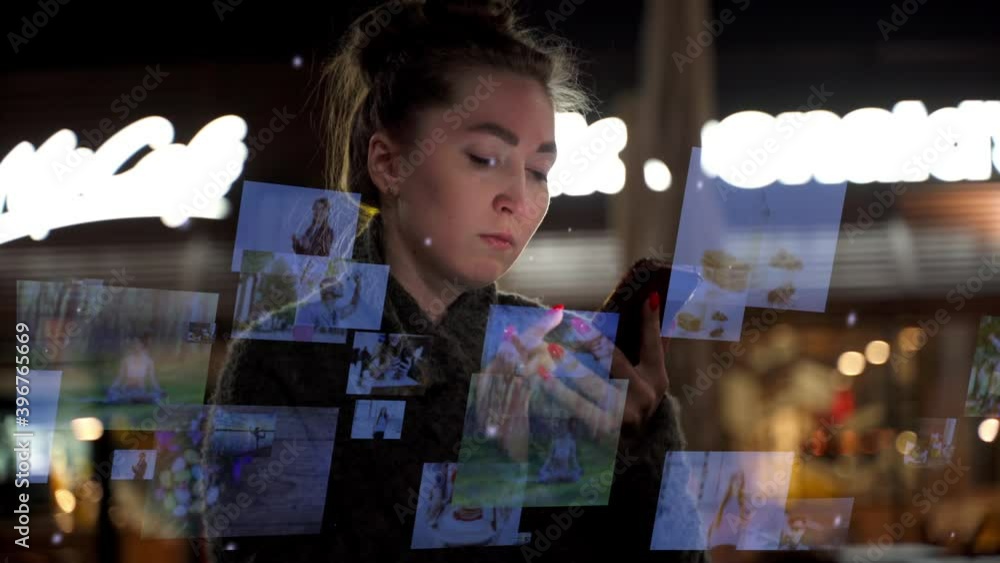 Concept of Social networking service. Caucasian woman standing in the street and using a smartphone. Communication network.