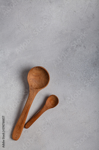 Wooden spoons on a light background