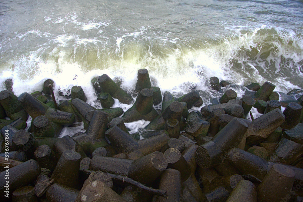 Waves hitting a tetrapod sea defense