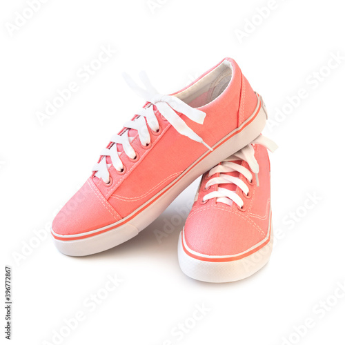 Casual pink shoes sneakers isolated on white background