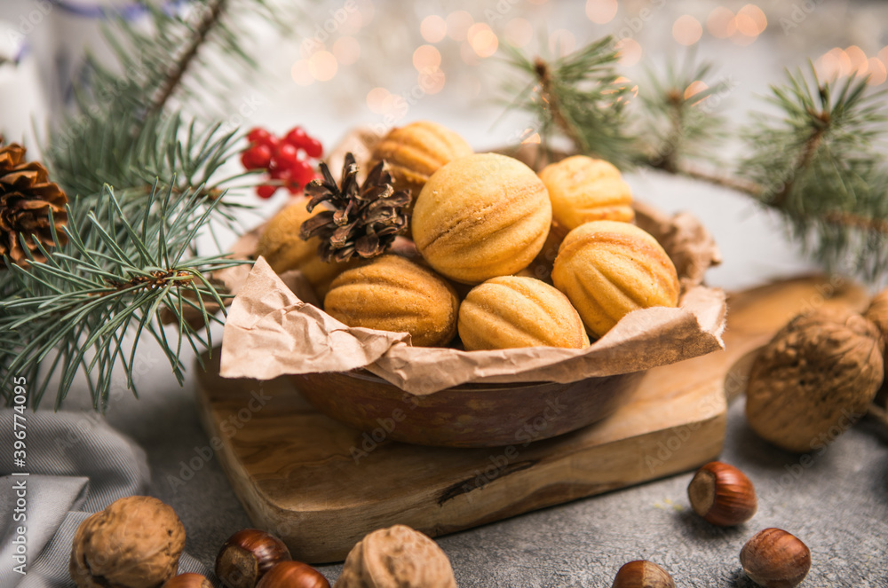 Chriatmas food. Shortbread russian walnut shaped cookies Oreshki with caramel.Close-up Chriatmas food. Shortbread russian walnut shaped cookies Oreshki with caramel.Close-up