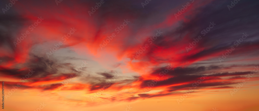 Fototapeta premium background of cloudscape with red clouds at sunset on sky