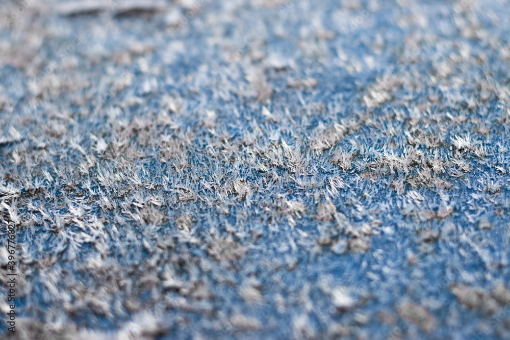 White hoar frost crystals on flat surface closeup view White hoar frost crystals on flat surface closeup view