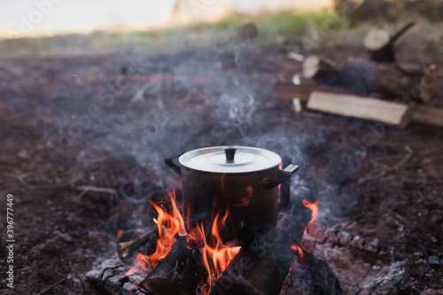 campfire and dishes in the campsite