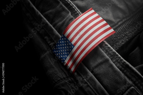 Tag on dark clothing in the form of the flag of the United States of America