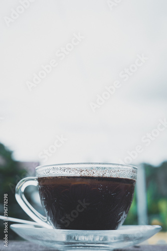 cup of coffee on wooden table