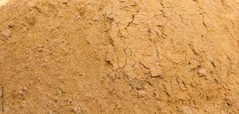 River sand, flat surface of yellow quartz wet sand in a quarry. River sand, flat surface of yellow quartz wet sand in a quarry.