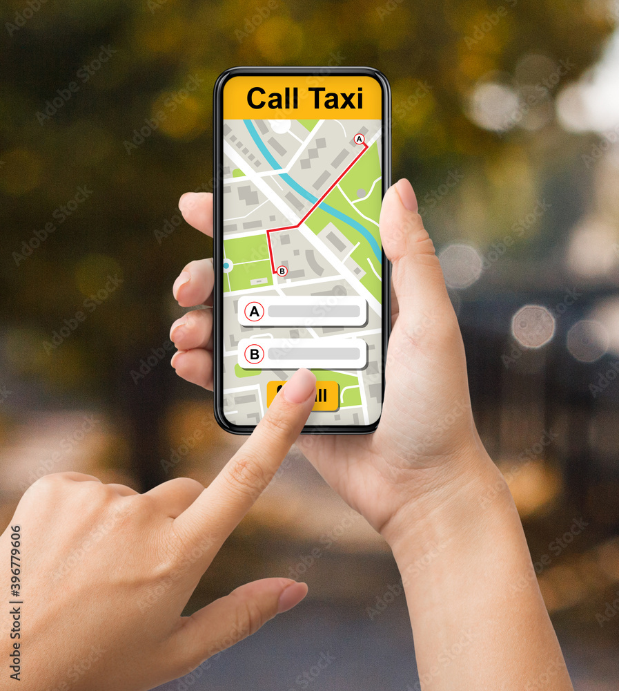 Fotografie Lady holding smartphone with taxi app interface