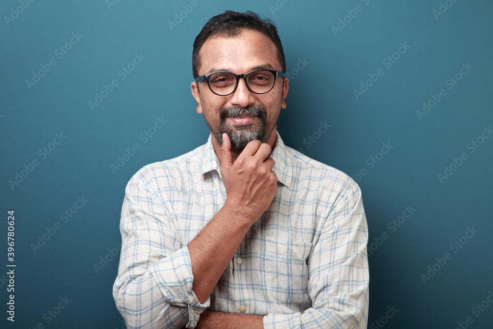 Portrait of a smiling man of Indian origin Portrait of a smiling man of Indian origin