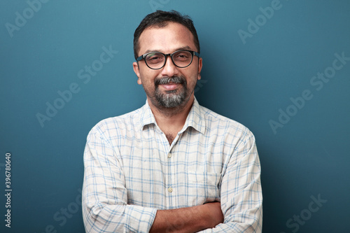 Portrait of a smiling man of Indian origin photo