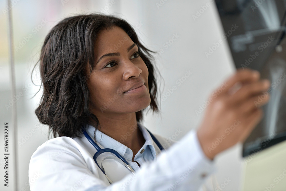 Portrait of radiologist looking at X-Ray Portrait of radiologist looking at X-Ray