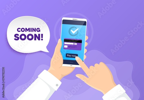 Coming soon. Pay by card from phone. Promotion banner sign. New product release symbol. Coming soon chat bubble. Online payment by credit card. Hand hold smartphone. Vector