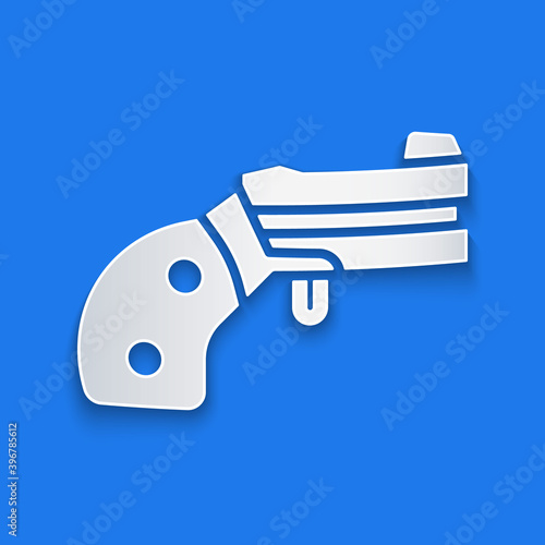 Paper cut Small gun revolver icon isolated on blue background. Pocket pistol for self-defense. Ladies revolver. Spy Weapon. Paper art style. Vector.