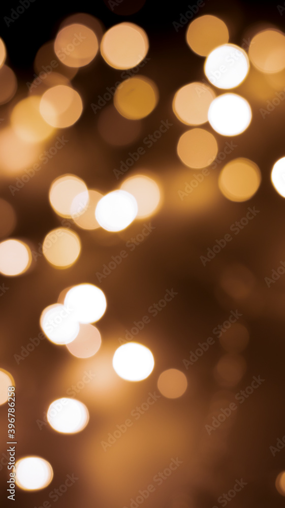 Beautiful festive bokeh on a black background golden circles, light night bokeh effect, deflated. Festive postcard, night view. Beautiful festive bokeh on a black background golden circles, light night bokeh effect, deflated. Festive postcard, night view.