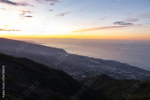 Fototapeta Naklejka Na Ścianę i Meble -  Beautiful view of Puerto de la Cruz from El Teide Mountain duing the blue hour, Tenerife