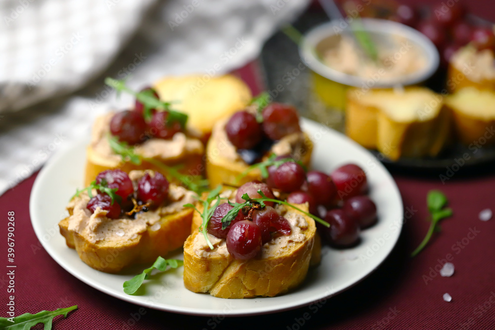 Soft focus. Canapé with pate and grapes. Delicious and healthy snack.