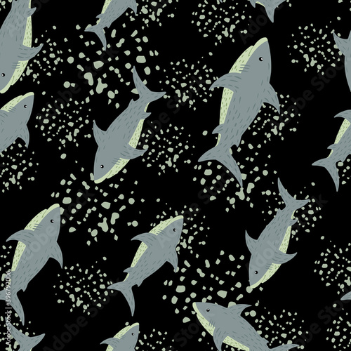 Random seamless sea pattern with blue shark ornament. Black background with splashes.