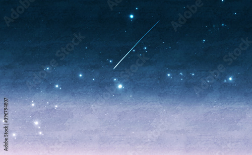 流れ星と星空の宇宙空間背景イメージ素材