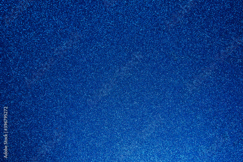 Dark blue shiny background with sparkles. Abstract holiday background