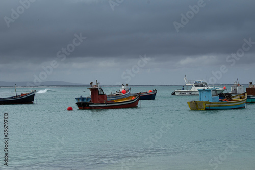 Boats in the harbour after a days work, Struisbaai harbour, South Africa