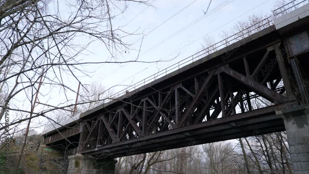 Large train overpass shot from below rural Large train overpass shot from below rural