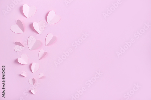 .top view of paper hearts on pink background © kolosyuk