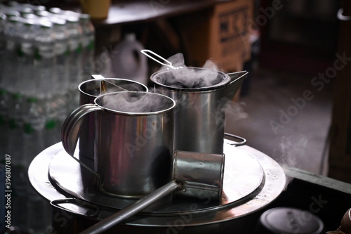 Thai Ancient coffee boiled equipment by the hot water