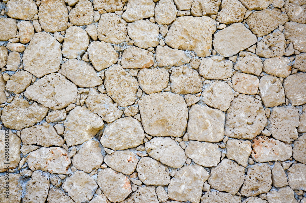 Texture of an old stone wall. Well seen pattern. Texture of an old stone wall. Well seen pattern.