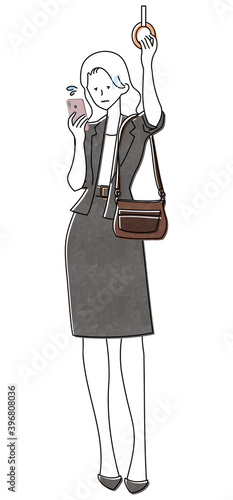 電車にのる女性