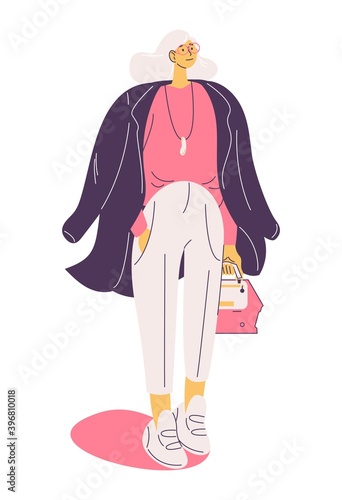 Woman in casual autumn clothes with coat on shoulders isolated on white