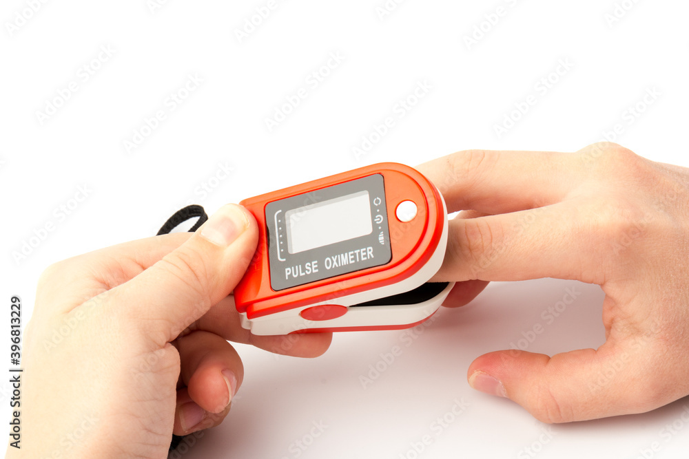 Pulse Oximeter, finger digital device to measure oxygen saturation in blood. Coronavirus symptoms concept. Pulse Oximeter, finger digital device to measure oxygen saturation in blood. Coronavirus symptoms concept.