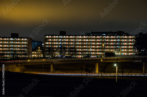Photography Stockholm, Sweden Apartment buildings and highway in the  Rinkeby suburb at  night