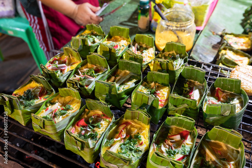 special grilled eggs in banana Kratong leaves street food at Pai district, Mae Hong Son, Thailand
