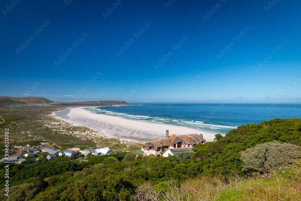 Panorama view of Noordhoek Long Beach near Cape Town, South Africa.