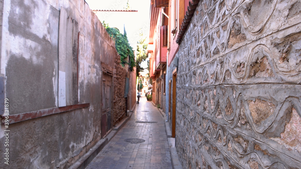 Narrow street of old town Kaleici at Turkey. Buildings along a narrow street at Turkish city.