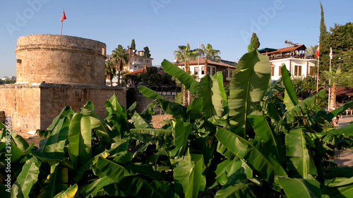 Ancient castle in old town Kaleici, Antalya. Hidirlik Tower, Karaalioglu Park in the old town Kaleici. Antalya, Turkey. photo