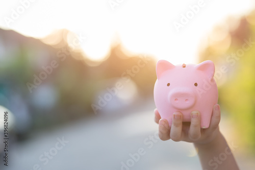 piggy bank in a hand