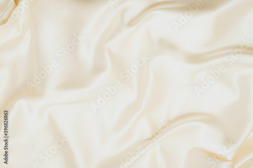 Golden silk texture. Satin delicate shiny finish, beautiful backdrop for designers.
