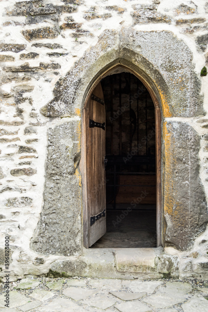 Open medieval door. Old open door.