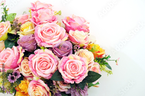 Artificial rose bouquet on a white background