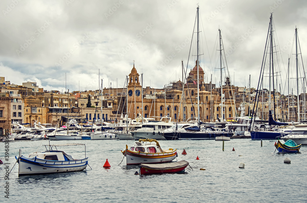 A lot of boats and yachts in the port of La Valletta, Malta