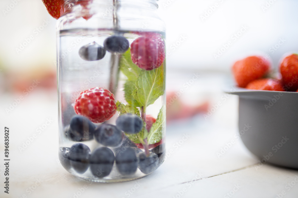 Raspberry, blueberry, and mint drink inside a jar Raspberry, blueberry, and mint drink inside a jar