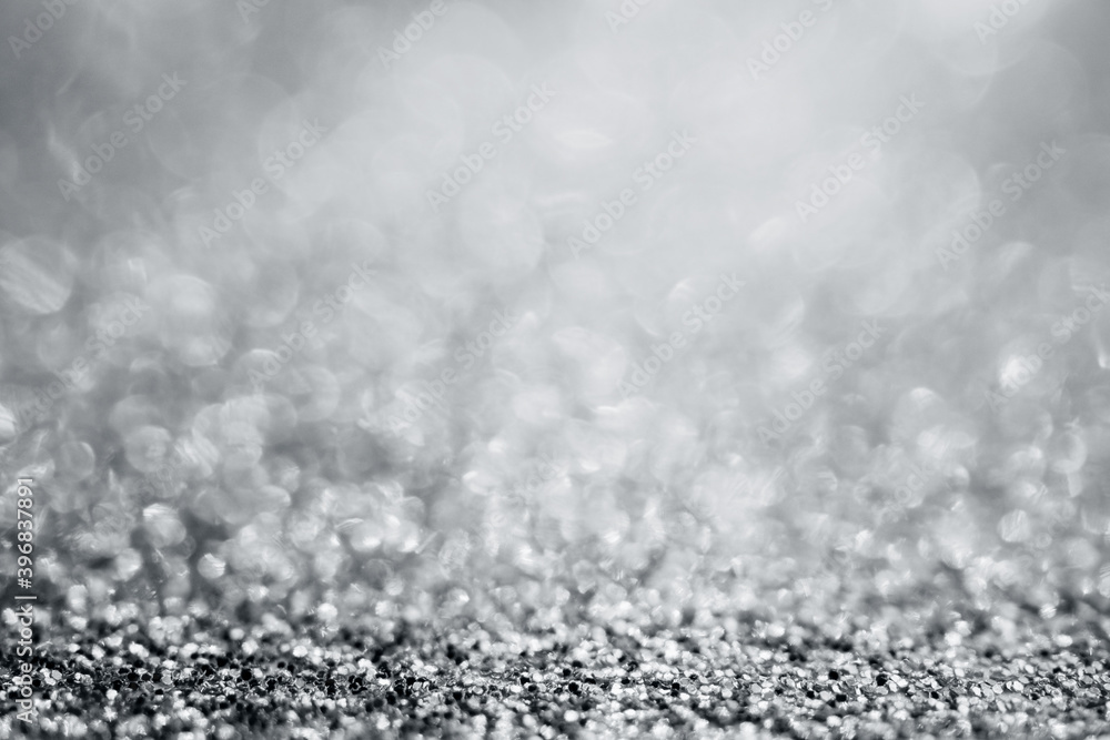 Abstract silver glitter sparkle texture with bokeh background