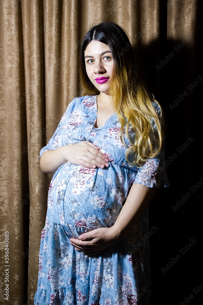 beautiful pregnant woman in the studio