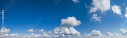 Blue sky with clouds  wide cloudscape background panorama